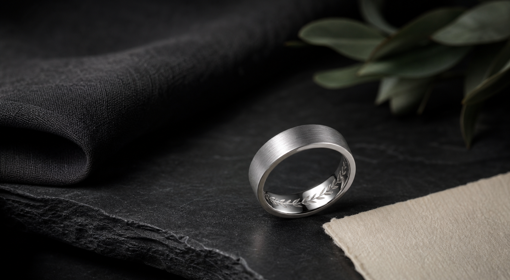 Premium black engraved wedding bands for men image with a dark masculine ring finish